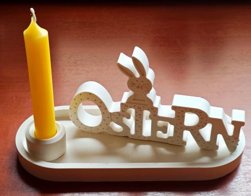 Osterensemble auf Schale oval mit Kerze